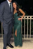 Fit very well! Got many compliments! It was a stunning fabric and color in person! FYI, I wore 4 heels and had to hem off a few inches myself due to the length, since I am 5 feet tall. But a great dress for a wedding! - Cristina F.