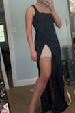 This dress is pretty flattering, but the design is a bit odd. The straps are super long on me, and the slit is incredibly high. I'm 5'4" with long legs, and the slit goes to my hip/bikini line. Sit down or get caught in a gust of wind and everyone would see your undies. I want to love this dress, but if it needs two alterations, I'm not sure anymore. - Lindsay S.