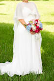 I purchased this and multiple other dresses from Lulus. I'm very grateful for the return policy, as I was able to try on dresses and pick the perfect one for our last-minute elopement. I paired the dress with a long cape instead of a veil, and it was perfect. The dress had everything I envisioned for my wedding day. It was comfortable, lightweight, and great for the Florida heat. I could not have designed a more perfect dress for me! - Cearie B.