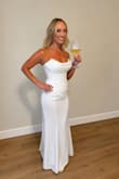 This dress is so high quality and perfect. The back being corset style makes it so easy to put on and adjust. It was so comfortable all night dancing. I tried dresses on and several bridal shops and this dress was less than half the price and better quality. It makes your body look so slim and hugs in all the right places. Order this dress - Stefanie S.