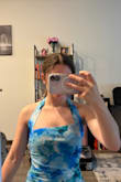 At first I thought there was a design flaw, but after looking at the dress on the model, I realized it was supposed to be asymmetrical at the top. I personally didn't love this neckline. I had to use fashion tape to keep my chest covered on one side, but I got this dress on clearance last minute for an event, and it got the job done. Everything else was great: length, fabric, stretch. I felt comfortable in it besides the neckline. And the colors are pretty. - Rylin Y.