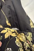 The dress came in poor condition, with a rip in the seam at the waist. I don't know if this was a previous return that wasn't checked, but I ordered two dresses and one came with a band around it that you could not remove until ready to wear. This one did not come with that band. - Sondra T.