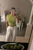This top has a very beautiful green color and snatch your body well. You can use it for any occasion. - Jessica H.