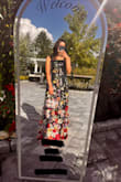 I am so pleased with this dress! It's absolutely stunning. I got so many compliments on it, and it fit beautifully. I am wearing 4inch platforms, and I could have gone for another inch. However, holding the dress up slightly honestly made the dress all the more pretty and elegant. I couldn't be more pleased. And! It really did come with the two day shipping. I am SO happy and relieved. Such a beautiful gown. Thank you Lulus! - Christina C.