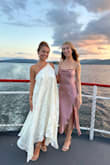 I wore this dress recently for my rehearsal dinner as the bride the day before my wedding. It was a complete showstopper. People loved it, and I kept getting compliments. The rehearsal dinner was on a boat therefore, the slight breeze made the layers of dress flow gorgeously for photos. People kept calling me a Greek goddess. I never felt the dress was too big. It actually is true to size. Just understand the dress is not form-fitting- it is meant to be a loose and flowy masterpiece. - Marilyn O.