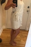 I initially got this dress for work but I think I will probably wear it to the beach instead it is very light and flattering. It is a little big around my chest area but I felt like if I went any smaller it would be too tight on my rear end. - Gabrielle D.