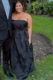 This dress was amazing!! I had a baby a couple of months ago, so I needed something that I would feel confident in. As I am still breastfeeding, I did need to wear a strapless bra to help keep the girls up! Quality was amazing, and the adjustable corset was great. I got so many compliments! - Quinn H.