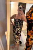 It's such a gorgeous dress & if I keep it, I will have to tack each large petal down since it looks so funky when they're flopping all over - Allyson A.