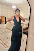 This dress was gorgeous and had such a flattering fit, but definitely runs small! I ordered a medium (my usual size, I have a 36 bust/29 waist), and it was incredibly tight around my ribcage, especially. I've ordered several dresses at the same time in M, and I'll have to size up to L now, I think. Overall though, the fabric flowed nicely and looked good quality. - Taylor P.