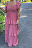 This dress is really sweet and lovely. I found the bust to be a bit loose (and I'm busty). I did have to pull it up in the front- the back tie can be really helpful in this respect. - Mary A.