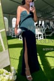 I bought this for a summer wedding at the lake. It's not too low cut at all, and the fabric wasn't too hot! I needed to get it shortened, but other than that, no complaints! I'm wearing it to another wedding in October, and the color is totally appropriate. - Brittney K.