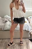 Wore this top for a night out on my bachelorette and it was comfortable and pretty! The shirred back and adjustable tie make it forgiving, and the material looks/feels like linen. I knocked off a star because when I washed it (delicate cycle), it had some pilling and had dulled a bit. - Helen C.