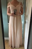 The dress fits perfectly but is a bit long when wearing flats. I'm wearing this dress with heels to my bridal shower so that I don't have to get it hemmed. The zipper is a bit tricky without someone there to help but I still managed. I really love it and can't wait to wear this for my shower and honeymoon! - Kristin S.