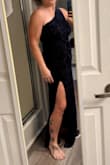 Gorgeous dress, I wear a 10 normally and this dress was a little big as a large, but I would have worn it if the tattoo on my chest was fully covered. The slit is high. - Kathy F.
