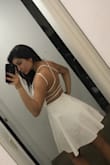 Absolutely love this dress. The material is thick so you won't see through it and a bra isn't needed. The dress really accentuates your body. I love the open back detail. Will be taking grad pics with this dress! - Jackie E.