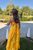 Got this dress for a black tie wedding on a wildflower farm and it was perfect! I got so many compliments. I did have to get the straps taken in by alterations about an inch because I have no boobs! Definitely had to watch a few videos on how to tie pretty bows. But I received so many compliments and loved it. - Brittney F.