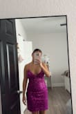 Was very excited about this dress, let me down. In the picture it looks pink, is actually purple. Bottom of the dress is too long and loose. Doesn't fit well on my body. - Gaby O.
