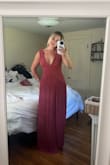 This dress is even more stunning on than I imagined! Going off the size guide, I got a size large; normally I wear a medium, but I'm definitely glad I got the large as this one hugs me perfectly. It's a little tight around the bust, but not to the point where it's uncomfortable. So flowy, soft, and hides anything you don't want showing! I'm also tall, and this length is perfect. - Alexia A.