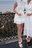 Alvana White Plisse Mock Neck Ruffled Mini Dress