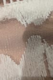 This item ran a bit loose in the back area. I exchanged it for an xxs and the pattern and the way it was stitched were horrible. The first one I got in XS, the stitching was wonderful; the size was wrong. Now the size is right, but the stitching is horrible. These photos are just a small section. There are lots of areas of the pattern not sewn well. Which makes the dress look cheap. Everything else I got was made well. - Maria V.
