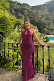 I wore this dress to a destination wedding in Portugal and I LOVED it. It fit me like a glove and I received so many compliments. The color is so vibrant and the cape is so sophisticated and adds that extra touch. Best purchase! - Ana-Michelle V.