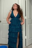I tried on the same dress in a different color and size in store and loved it so much I ordered it online and it came within a week. It fit so perfectly and I was worried about having to wear some kind of bra or it not fitting quite right but I was actually blown away with how good it looked! - Emily E.
