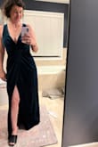 It is a bit low cut and allows for a good amount of cleavage so plan accordingly. The dress itself is beautiful and fits well. - Danielle B.