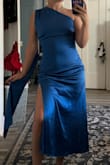 Bought this super last minute for a wedding and can't complain! I thought it fit well enough; the color is really nice in person. I'm short, and the length was perfect with heels. It's pretty true to size. I have a more athletic back, so it didn't drape as pictured on the models; this made the section under my armpit gape out slightly- just something to keep in mind if you have a stronger build! - Chloe R.