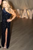This is a beautiful dress. It looks black, but it's a beautiful deep blue with velvet appliqués, and is just so flattering! - Anita A.