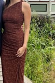 I got a size small - This dress was great for an early fall wedding. It was comfortable and form fitting. It has multiple layers of fabric with a lot of stretch! - Katerina R.