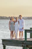 This is a beautiful dress with impressive fabric. It was a little tight as a small, but the medium was a perfect fit. - Gretchen C.