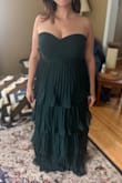 This dress fit me like a glove!! Based on reviews, I ordered an XL to make sure I'd have room for a sturdy strapless bra, and it was a perfect fit. It does run long on me; I'm 5'3", but ordering some platform heels to help there. I had a baby about 2 months ago and have been very self-conscious of my stomach and boobs, but this dress makes me feel so confident and pretty! I'm excited to wear it as a bridesmaid and see how it holds up all night! - Erica R.