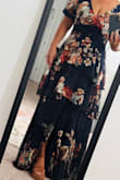 I ordered this dress for a fall wedding in a few weeks. I was going back and forth between ordering a medium or a large, but ultimately decided on a large because I'd rather it be a little too big than too small. I am quite happy with the overall fit. I am having a couple of inches hemmed off the bottom because it is a bit long for me, even with an added 2 inches for shoes, but I am only 5'2 and used to that being an issue. I probably could've done a medium, as it is flowy throughout, but the medium may have been too tight in the chest area (34/36 D) and just overall not as comfortable. I will say it is super cute, and I am now looking forward to the wedding! - Mandy S.