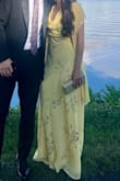 I always worry about wearing a light color (light yellow, light pink) to a wedding for fear of it showing up white, but this is a true, bright butter yellow! And the silver details are gorgeous! I got compliments all night and someone even tracked me down a second time to ask where it was from. - Maria D.