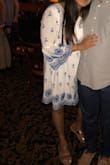 So I sized up because of the prior reviews, and it was really really big on me, so I took it to a tailor and got it taken down on both sides. Everyone complimented it so much! Super bohemian and flowy :-) - Anoosha A.