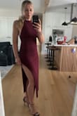 This dress was a show stopper. From the color to the fit. I can live in this dress. Stayed in place. Didn't need to adjust throughout the night. I was amazing. Getting it in black, but the burgundy was perfection. - Gosia C.