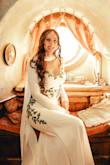 I wore this dress for my 20 year wedding anniversary/ vow renewal ceremony. My husband and I went to Hobbiton in New Zealand. To be more on theme, I sewed on the green leaf appliqué myself. It was perfect and exactly what I envisioned! - Kristina W.