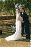 It fit perfectly, true to size, no alterations needed, adjustable straps, flattering. 10/10! I ended up getting the length cut just a tad and added a bustle. Very comfortable and flattering. - Lauren D.
