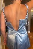 I love the dress, it's so cute, it fits right but the back won't zip up very sad about that - Abby C.