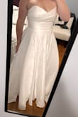 This dress is the one for me, HOWEVER- most of the reviews say it runs really big (I am a size large in every other Lulus dress I've ever ordered), so naturally I sized down to a Medium based on reviews, 3 dresses & 2 exchanges later, I've got an XL that fits like a GLOVE with zero wiggle room. With that being said, I think the fabric is the culprit here, not the dress. There is absolutely not an ounce of stretch in this satin, so your measurements have to be absolutely on point or it will not zip. If you're in between, size up. It was a journey, but I knew the second I put on the first Medium dress that wouldn't even pretend it was zipping that this was MY dress. Nothing else compares. The length is perfect, with a kitten heel I won't even need altering. - Miranda F.