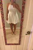 I bought this dress feeling a little skeptical about the length. Typically, dresses like this are way to small for my height, but this fits perfectly. It's the perfect length, and the open back and strings make it easy to adjust to your bust size. The material is really good quality, and I'm so excited to wear this to my graduation! - Kelli L.