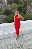 Wore this dress to a wedding in Italy. 97 degrees and the material held up, didn't wrinkle and was comfortable and stretchy enough to dance in. Highly recommend! - Alyssa C.