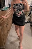 Such a cute dress! I'm obsessed! You can adjust the top. It's like a corset. All one piece! - Jessica S.