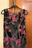 The product photos are beautiful, and the dress is as pictured, but I'm overall disappointed with the quality and fit of the dress. Velvet is directional; even cheap velvet can look classy when used correctly. The dress I received had the velvet grain facing down, so it was super shiny like a cheap costume instead of matte.
I fell between sizes according to the little test the website has, and I sized down since the overview said it had some stretch; it does NOT lol. The size I ordered (L) was just way off for me; I wasn't able to zip the dress more than halfway, and the hip was sitting way higher than it should. Definitely not curve-friendly, and I really don't think their size guide test is helpful past a size 10. Will be returning and not reordering. - Allison B.