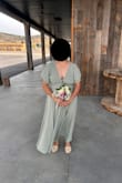 The dress was beautiful and better quality than expected. I'm 5'3 and I did have to get 6 inches hemmed off the bottom because it was way too long, and I would have been stepping on it. Unfortunately, my boobs didn't fit in it very well, and we had to safety-pin it so my boobs wouldn't be popping out. If it wasn't for those things, it would have been perfect. - Alyssa R.