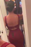 The back is beautiful. I'm usually a small/size 4, but I have DDDs, so it all depends on the stretch. The front was too tight in a small, so I ordered a medium, but it fit like a glove everywhere else. I LOVE this dress. I can have cups sewn in the front to hold me up since the dress itself keeps them up! It's long for me at 5'3, even with my 4" heels, but that's always been the case. Worth it for sure! - Kristine C.