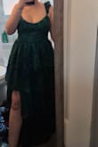 The dress fits perfectly, and I love the detailing in the fabric. However, there are a lot of loose threads/snags on the dress as soon as I removed it from the package. I also wish the neckline was a little higher, but that's nothing a little double-sided clothing tape can't help with (ensuring no wardrobe mishaps). - Amanda L.