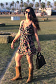 Great summer and spring dress. I loved how it was flowy but not as full as it looks on the model. The color in person looks amazing and the tie in the back can help if you want your front to be more open or more modest. One thing that bothered me was the boob area was a little too large so it looks like I have a saggy chest which kind of bothered me. You can wear a bra or pasties the bra will show in the back though. Great for country concerts and festivals! - Julie W.