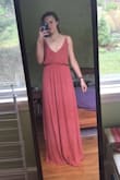 I have a very short torso but the dress fit me quite well. It's a gorgeous color and I'm wearing it to prom, which is nice because it's very comfortable. I was worried about the middle section (between two slits) getting caught between my legs but that doesn't happen at all! Overall loving it! - Millie L.