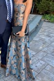 This dress was amazing and fit like a glove. I received endless compliments and felt great in it. It's thick and form-fitting, but I was able to dance fine in it. - Kristen D.